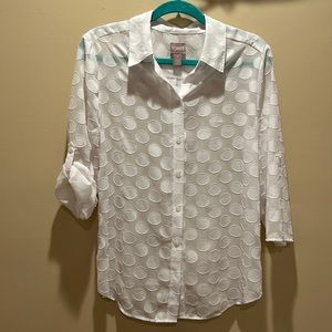 Beautiful blouse by Chicos love adjustable sleeves size 1 equals 8-10 .